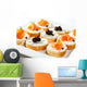 Mini sandwiches - bagel with cream cheese, salmon, caviar Wall Mural