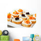 Mini sandwiches - bagel with cream cheese, salmon, caviar Wall Mural