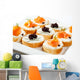 Mini sandwiches - bagel with cream cheese, salmon, caviar Wall Mural