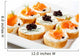 Mini sandwiches - bagel with cream cheese, salmon, caviar Wall Mural