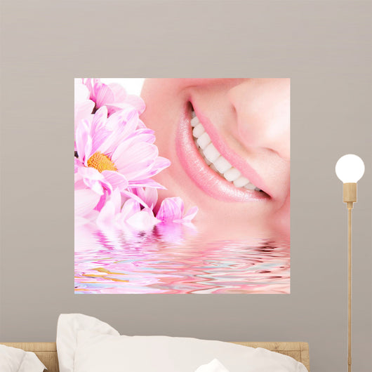 Smile of Young Woman With Flowers Wall Mural