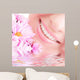 Smile of Young Woman With Flowers Wall Mural