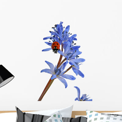 Ladybird Blue Snowdrop Wall Decal shown on a wall
