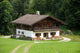 Wooden House in the German Alps Wall Mural