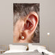 acupuncture needles in ear Wall Mural