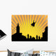 Silhouetted  superhero flying off into the sunset Wall Mural