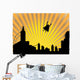 Silhouetted  superhero flying off into the sunset Wall Mural