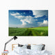Beautiful Clouds over green fields Wall Mural