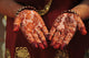 hands decorated with henna Wall Mural