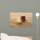 Stack of Pebbles and Light Candle Wall Mural