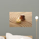 Stack of Pebbles and Light Candle Wall Mural