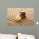 Stack of Pebbles and Light Candle Wall Mural