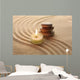 Stack of Pebbles and Light Candle Wall Mural