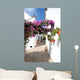 narrow, cobbled streets and houses of spanish pueblo Wall Mural
