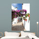 narrow, cobbled streets and houses of spanish pueblo Wall Mural