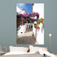 narrow, cobbled streets and houses of spanish pueblo Wall Mural