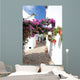 narrow, cobbled streets and houses of spanish pueblo Wall Mural