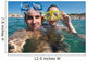 Lovely couple enjoying snorkeling during their vacation Wall Mural