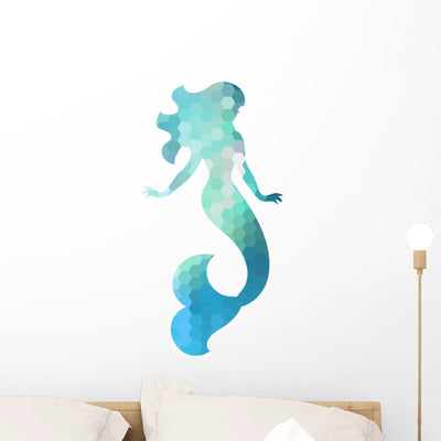 Silhouette Mermaid Wall Decal shown on a wall