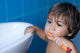 Child Washing Your Teeth With a Brush Wall Mural