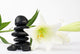 Black and white lilies zen pebbles Wall Mural