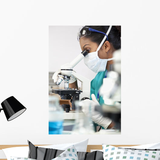 Asian Woman Doctor or Scientist Using a Microscope In Laboratory Wall Mural
