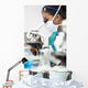 Asian Woman Doctor or Scientist Using a Microscope In Laboratory Wall Mural