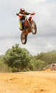 Motorcross Motorcycle Rider Flying through Air Wall Mural