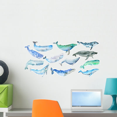 Blue-green Watercolor Whales Wall Decal Sticker Set shown on a wall