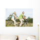 Mature couple riding tandem Wall Mural