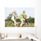 Mature couple riding tandem Wall Mural