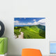 Mountain-ridge and blue sky with white clouds Wall Mural