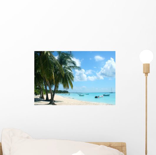palm trees and boats on tropical island Wall Mural