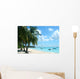 palm trees and boats on tropical island Wall Mural