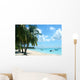 palm trees and boats on tropical island Wall Mural
