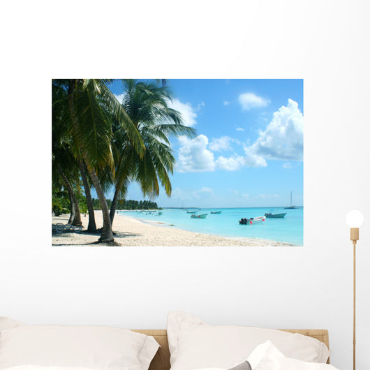 palm trees and boats on tropical island Wall Mural