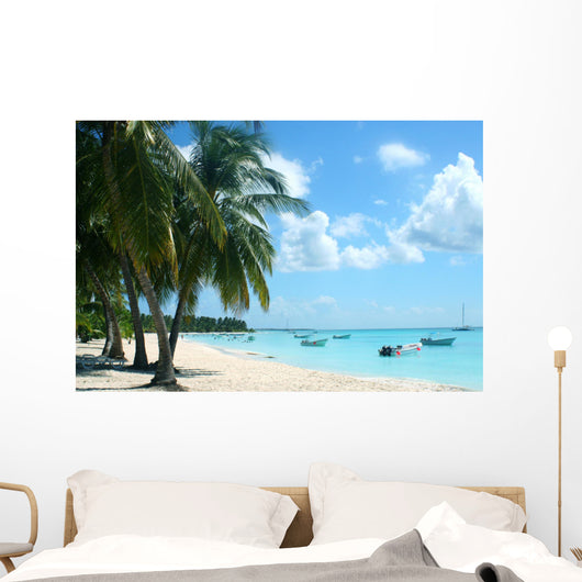 palm trees and boats on tropical island Wall Mural