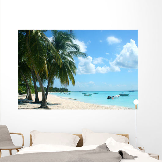 palm trees and boats on tropical island Wall Mural