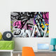 Abstract colorful graffiti background in a wall Wall Mural
