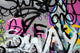 Abstract colorful graffiti background in a wall Wall Mural