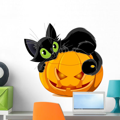 Black Cat Hugging Pumpkin Wall Decal shown on a wall