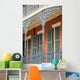 Ornate ironwork gallery in French Quarter house Wall Mural