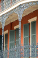 Ornate ironwork gallery in French Quarter house Wall Mural