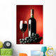 Glass and bottle of red wine. Wall Mural