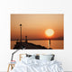 Tramonto sul lago di garda con siloutte di uomo Wall Mural
