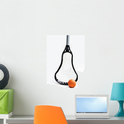 Lacrosse Stick and Ball Wall Decal shown on a wall