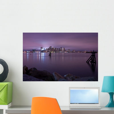 Boston Skyline Night Violet Wall Mural shown on a wall