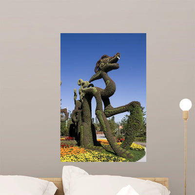 Flowers Decorate Chinese Dragon shown on a wall