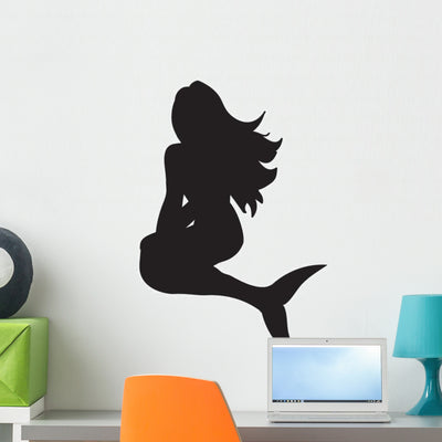 Silhouettes Seated Siren Mermaid Wall Decal shown on a wall
