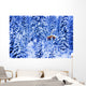 Small Lit Cabin In The Middle Of A Winter Forest Wall Mural